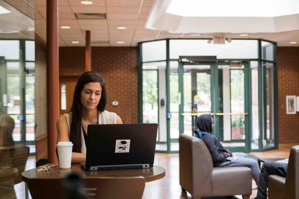 student on laptop in franks